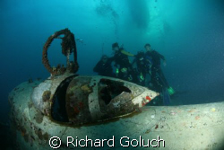 Group of divers posing with Betty Bomber-Truk Laggon by Richard Goluch 